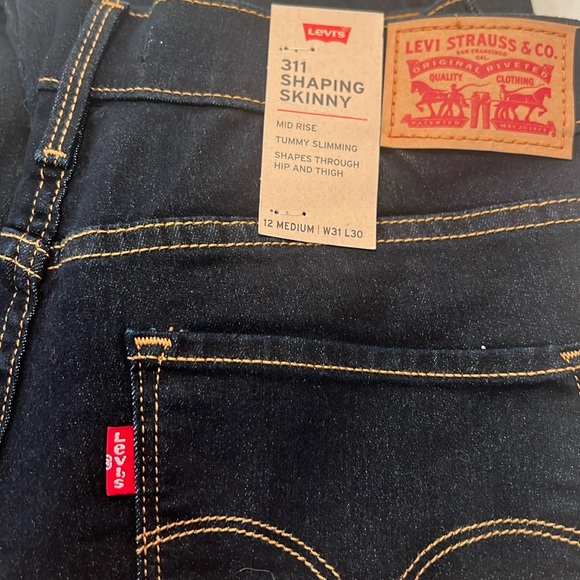 Two pairs of Levi Shaping Skinny Jeans size 12/W30 - Picture 1 of 3
